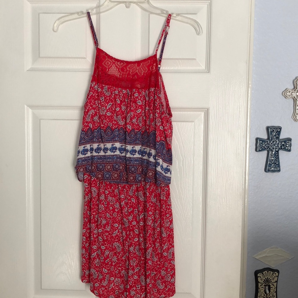 Red jumper with blue accents by Alya. Worn once.